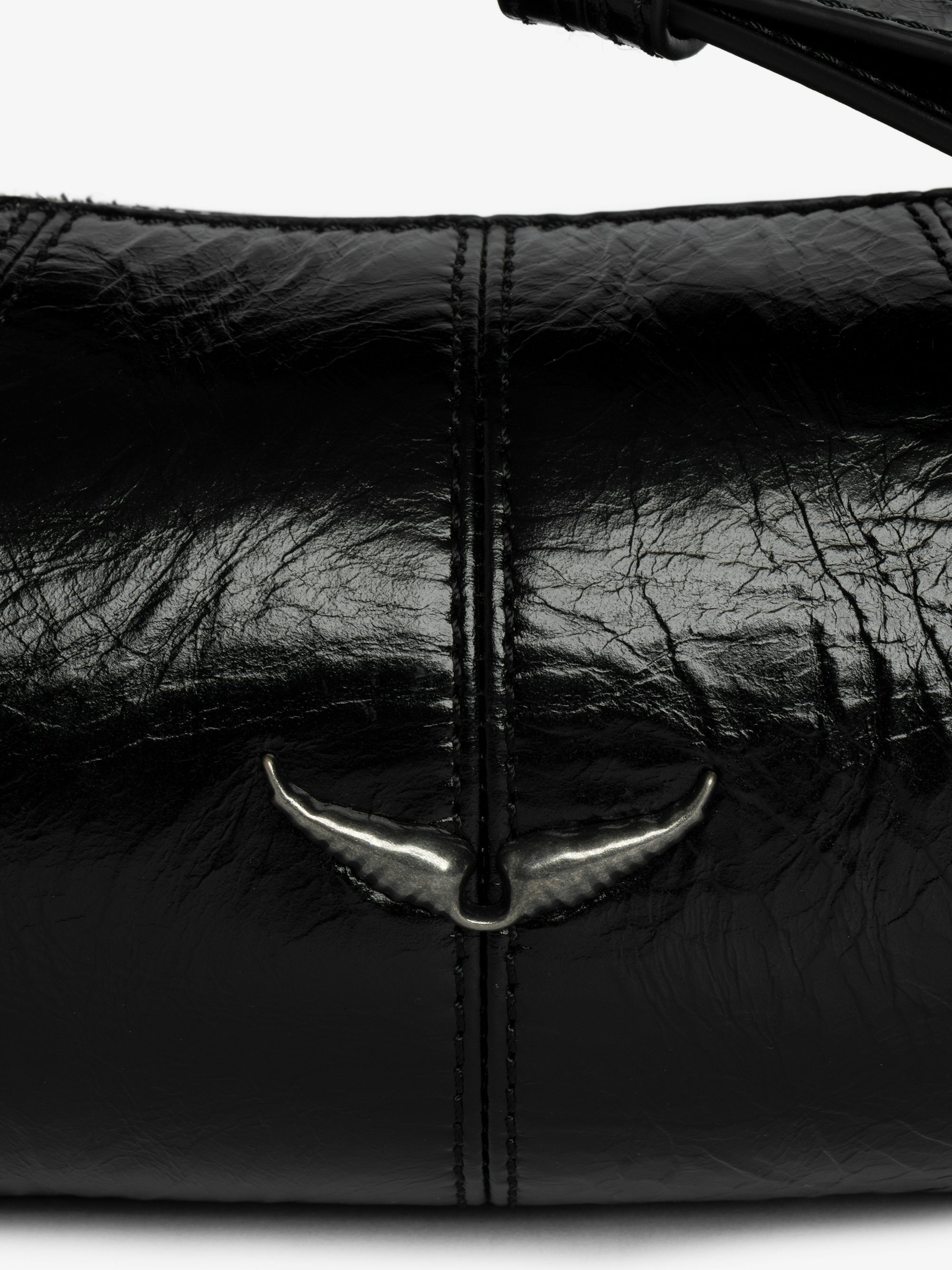 Le Roudoudou Vintage Patent Bag - Patent leather bag with vintage-inspired effect, adjustable shoulder strap and wings signature.